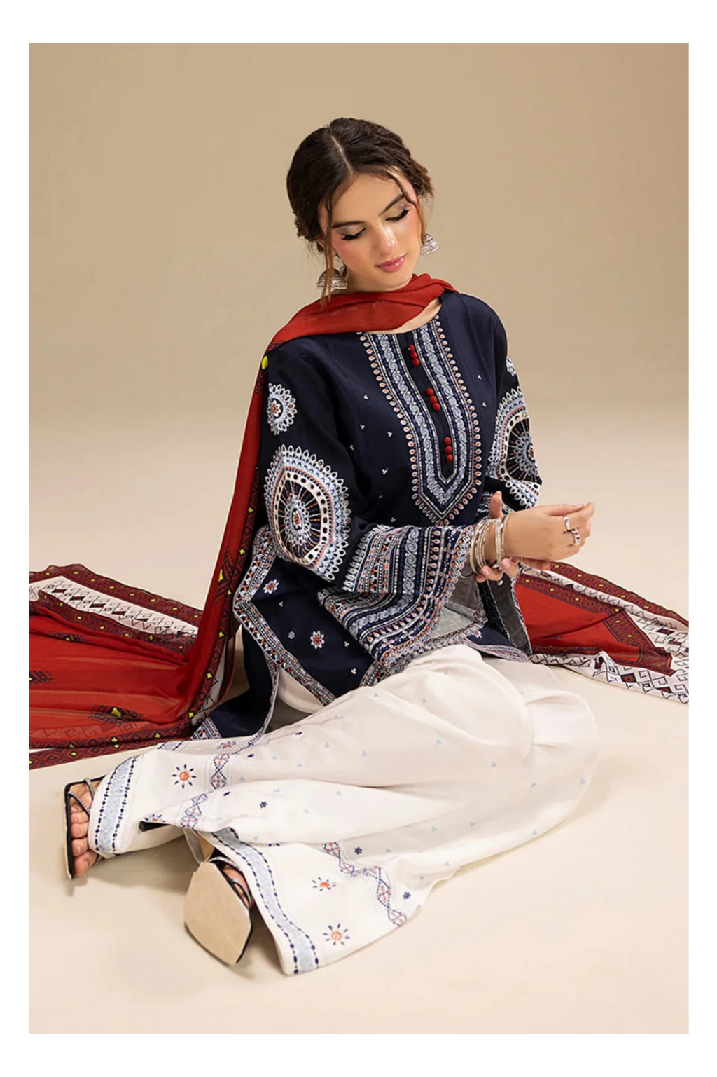 Its 3 piece unstitched Lawn Embroidered Dress IR-21