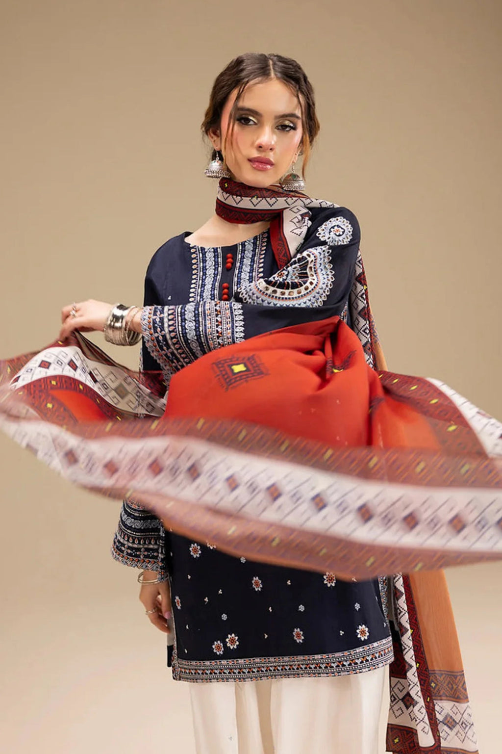 Its 3 piece unstitched Lawn Embroidered Dress IR-21